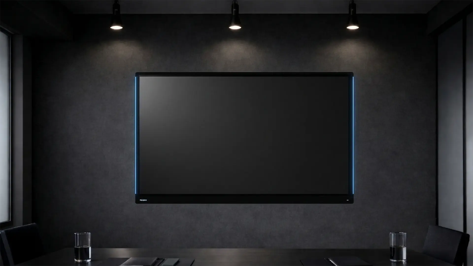 WORK PAD -ANSHI TOUCH AURA-。暗い会議室の壁面に設置された大型タッチディスプレイ